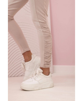 Dámske nohavice s volánom na bokoch