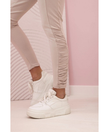 Dámske nohavice s volánom na bokoch