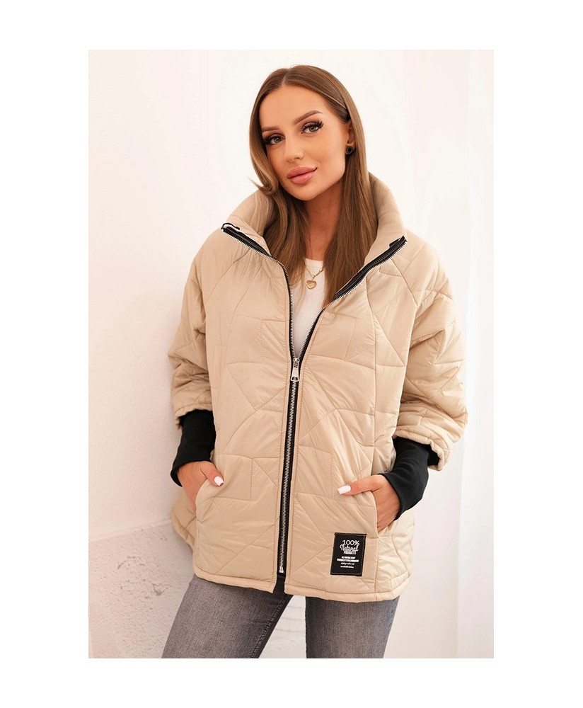 Dámska prešívaná bunda s krátkym strihom a stojacím golierom