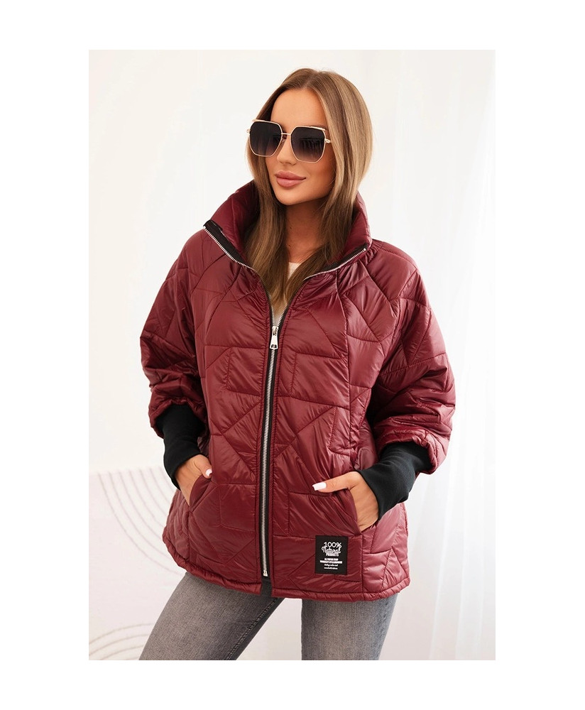 Dámska prešívaná bunda s krátkym strihom a stojacím golierom